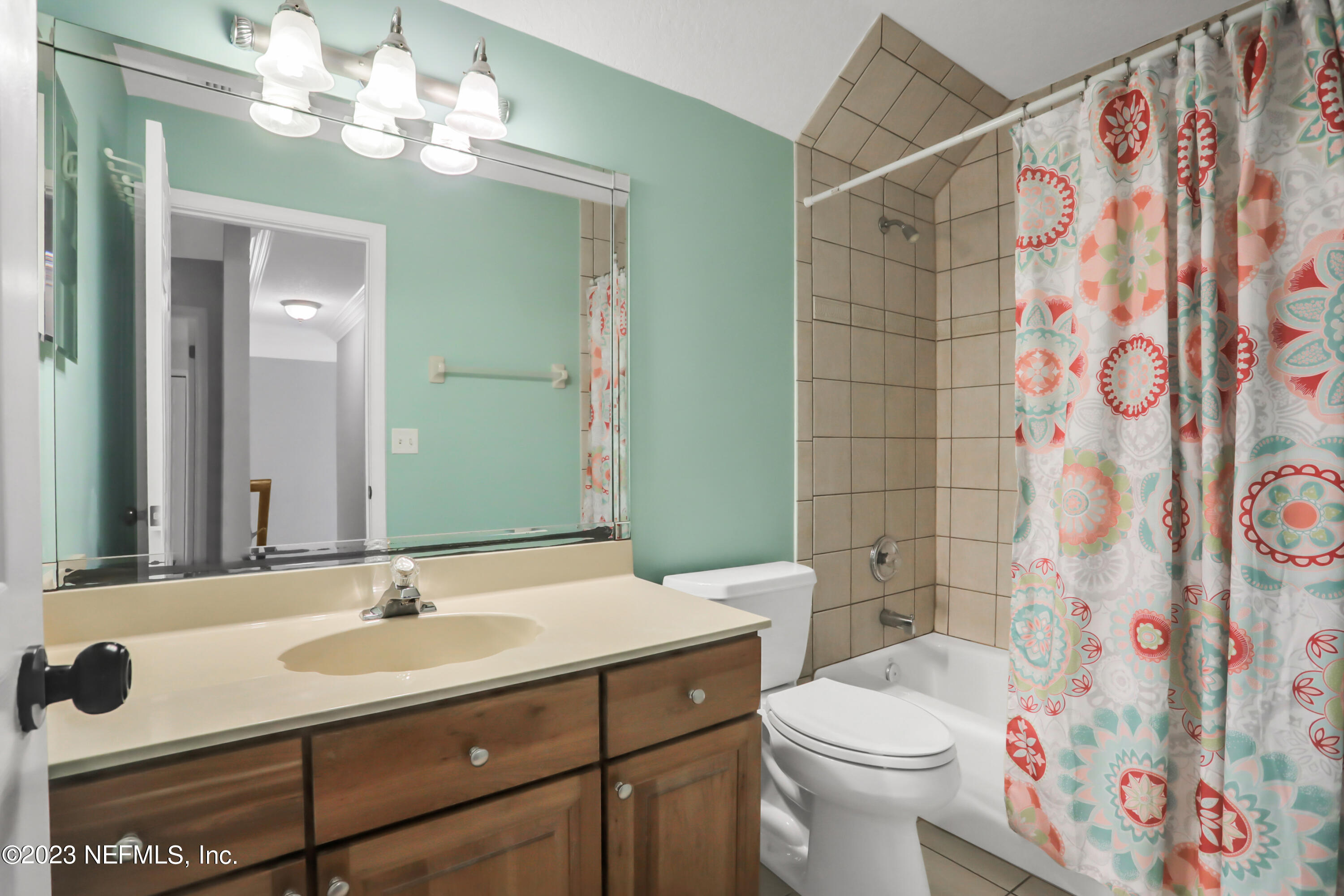 212 Twining Trace St. Johns, FL 32259 - Photo 29 of 60 a bathroom with a sink toilet and shower