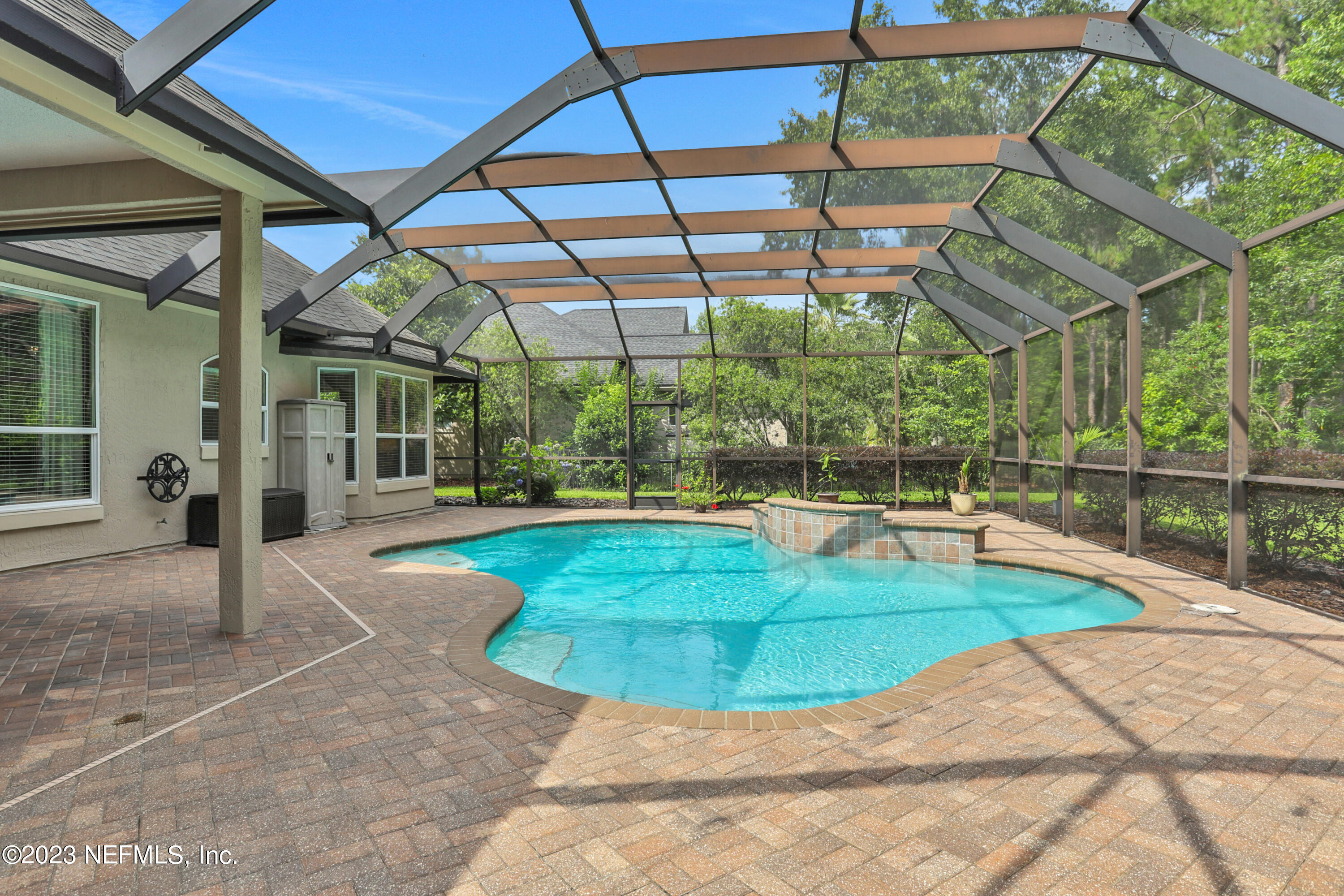 212 Twining Trace St. Johns, FL 32259 - Photo 33 of 60 a view of a swimming pool with a patio