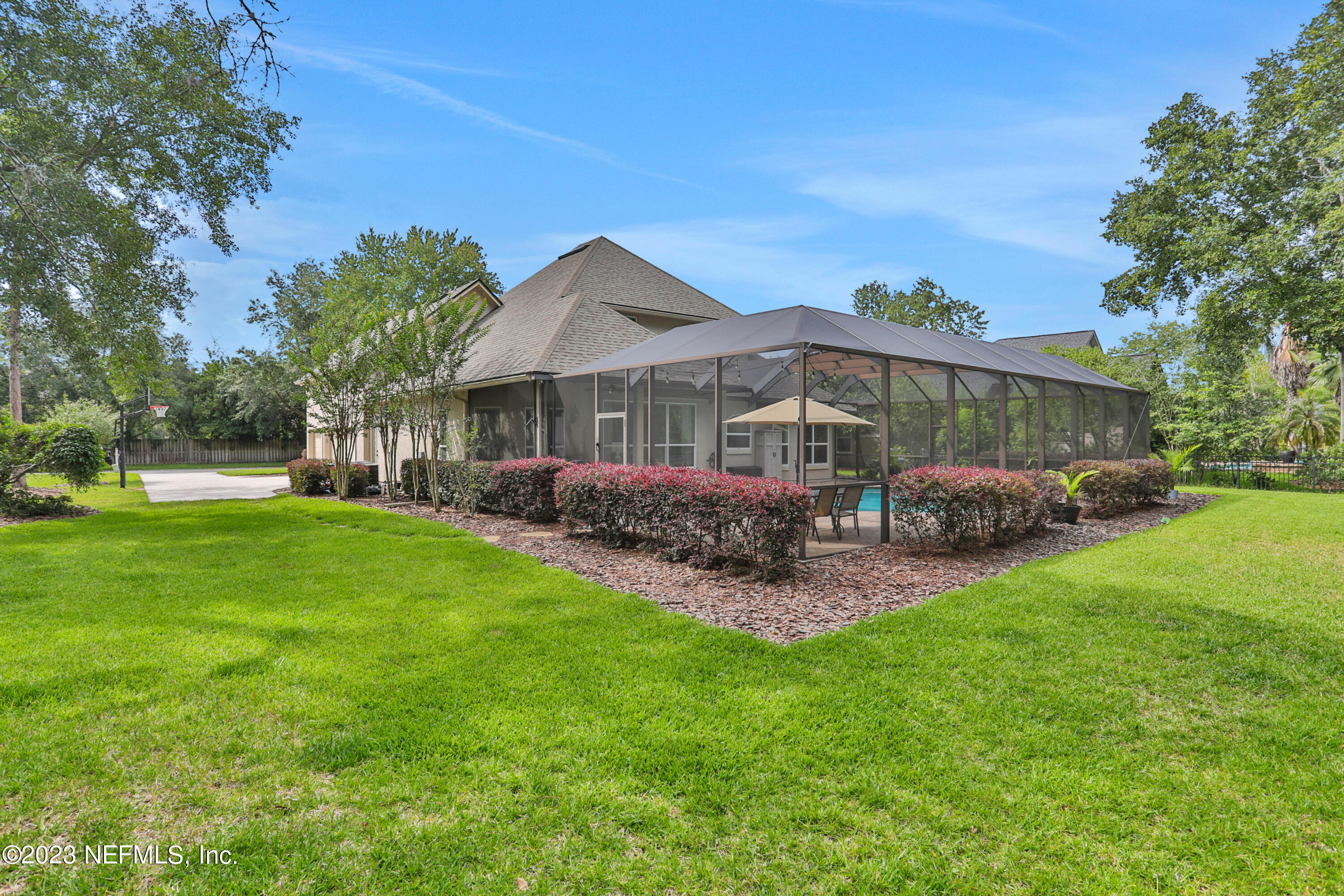 212 Twining Trace St. Johns, FL 32259 - Photo 38 of 60 a view of a house with a yard and sitting area