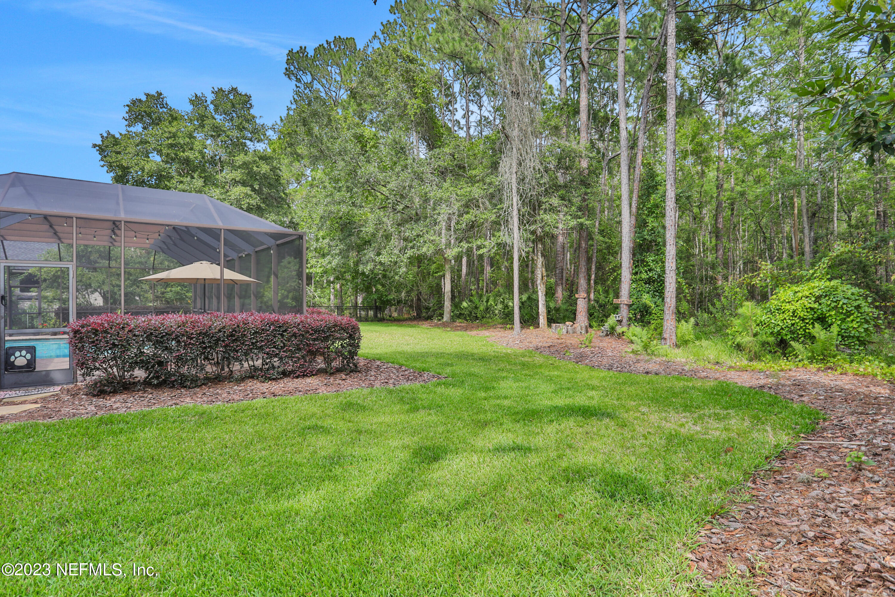 212 Twining Trace St. Johns, FL 32259 - Photo 39 of 60 a view of a house with a yard and sitting area