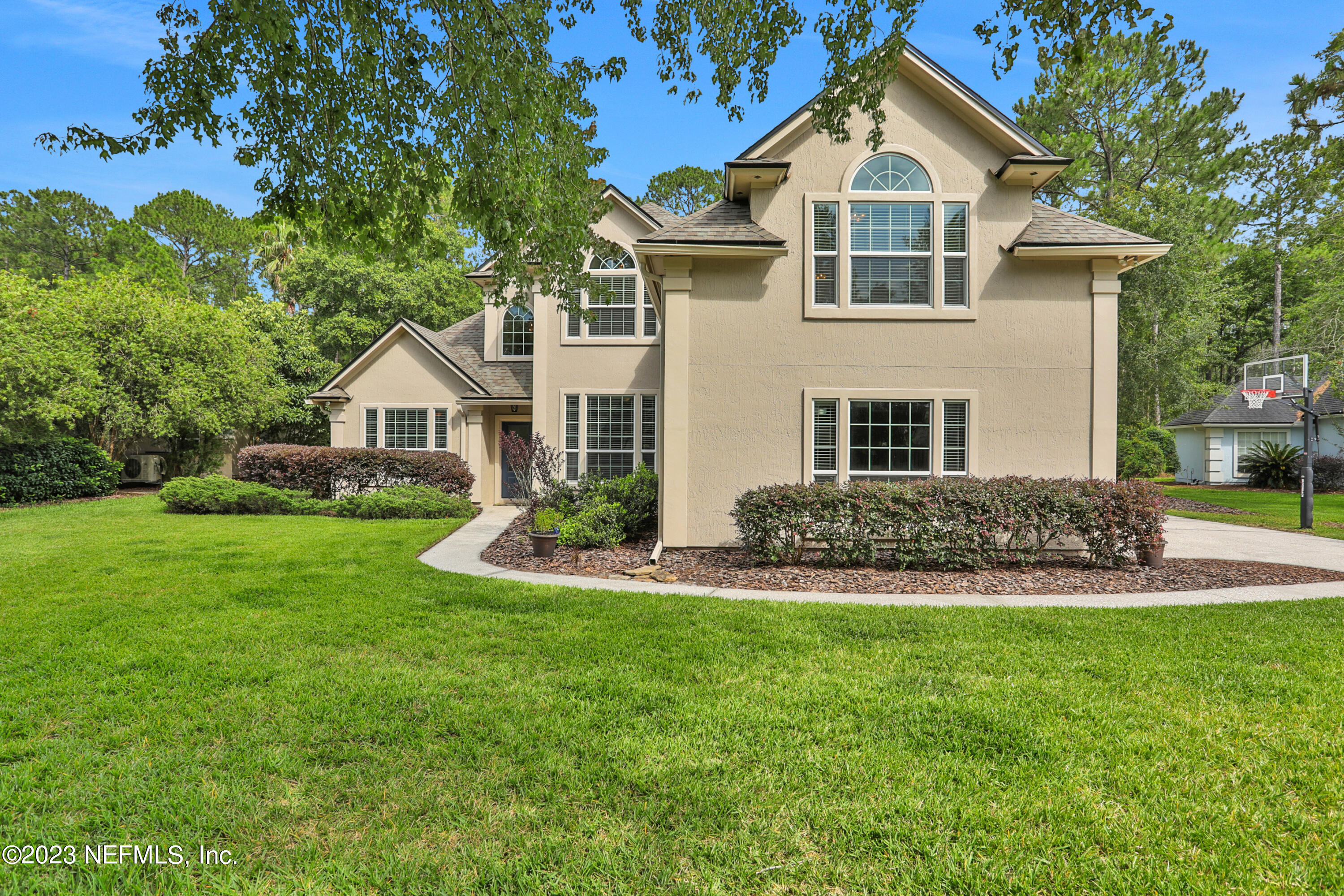 212 Twining Trace St. Johns, FL 32259 - Photo 41 of 60 a front view of a house with a yard