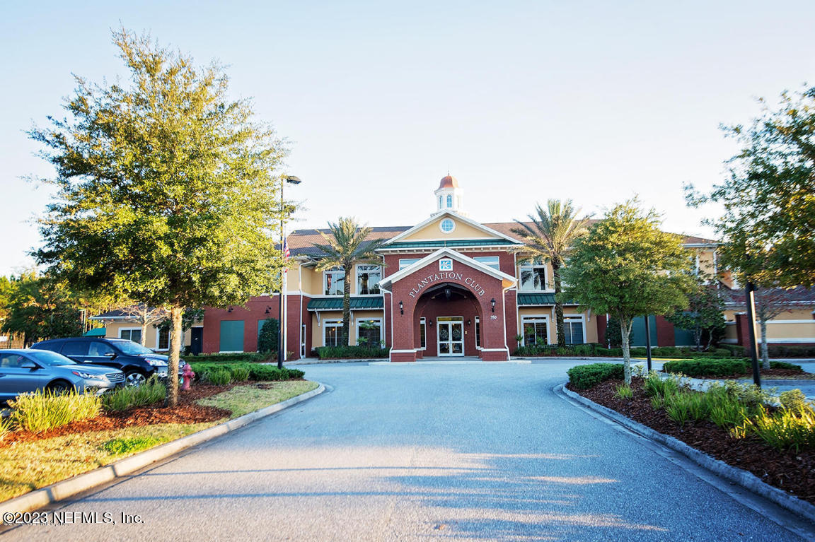 212 Twining Trace St. Johns, FL 32259 - Photo 43 of 60 a view of house with outdoor space and trees
