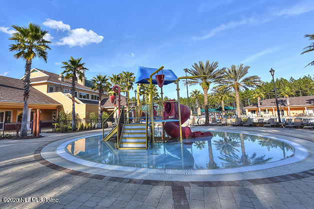 212 Twining Trace St. Johns, FL 32259 - Photo 46 of 60 a view of a swimming pool with a lounge chair