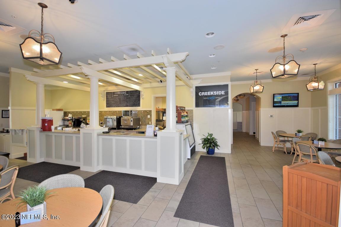 212 Twining Trace St. Johns, FL 32259 - Photo 48 of 60 a view of a living room and kitchen