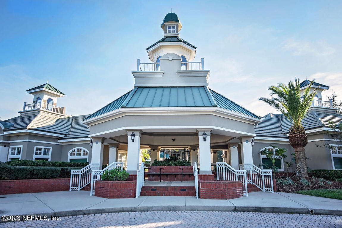 212 Twining Trace St. Johns, FL 32259 - Photo 54 of 60 a front view of a house with garden