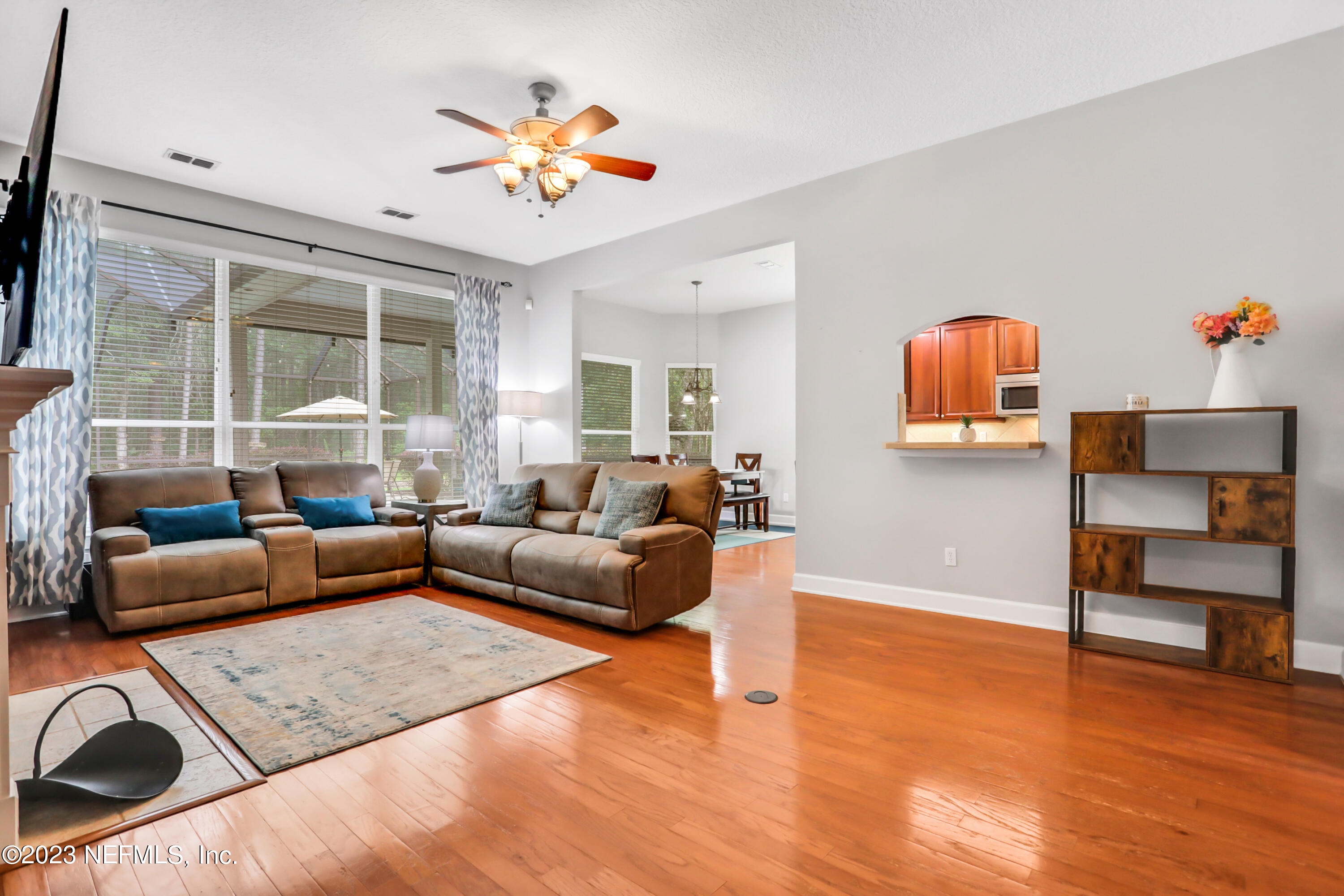 212 Twining Trace St. Johns, FL 32259 - Photo 7 of 60 a living room with furniture and a large window