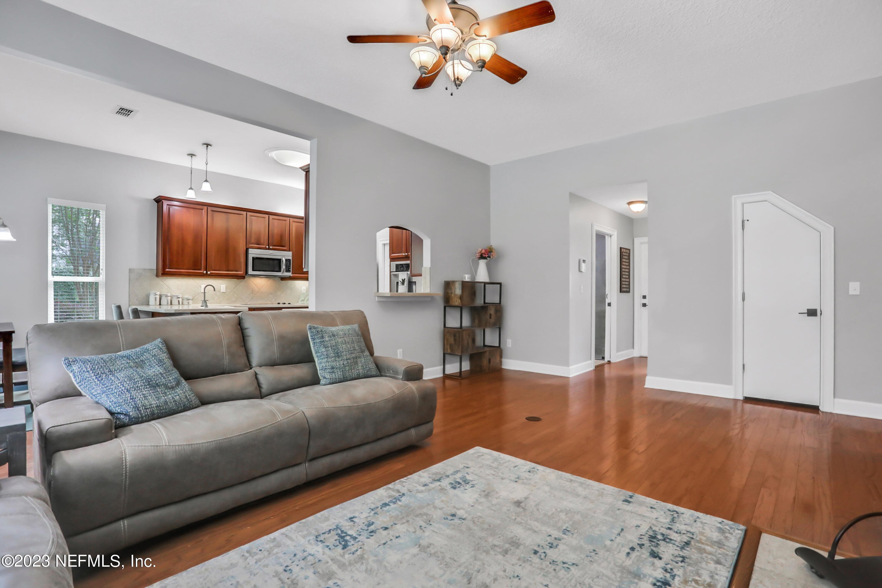212 Twining Trace St. Johns, FL 32259 - Photo 9 of 60 a living room with furniture and wooden floor