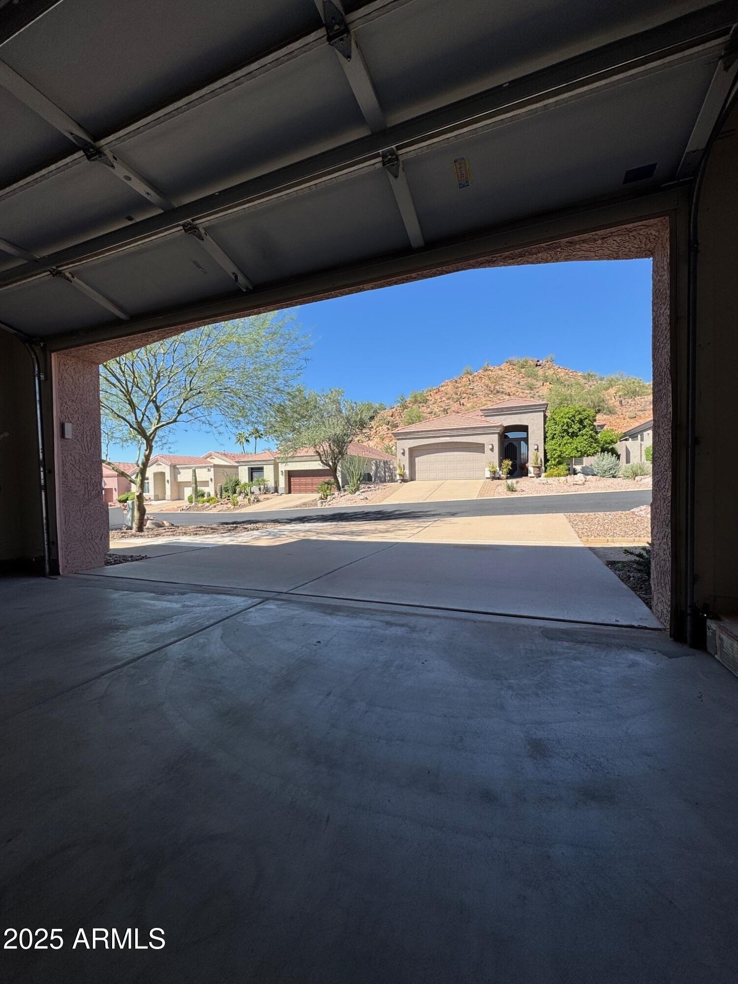 6334 East Viewmont Drive, Unit 57 Mesa, AZ 85215 - Photo 22 of 61 a view of an empty room with a window