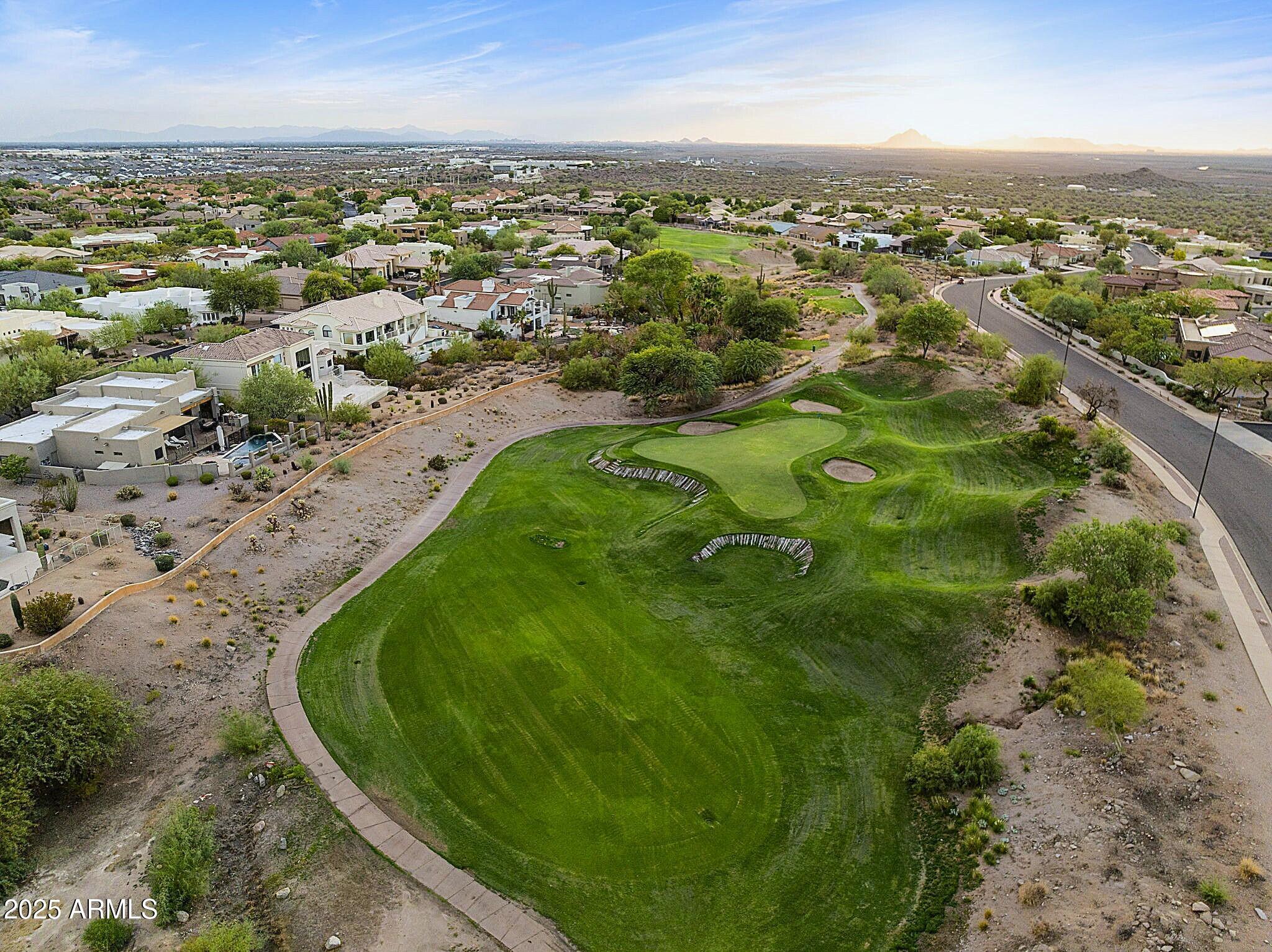 6334 East Viewmont Drive, Unit 57 Mesa, AZ 85215 - Photo 37 of 61 an aerial view of residential houses with outdoor space