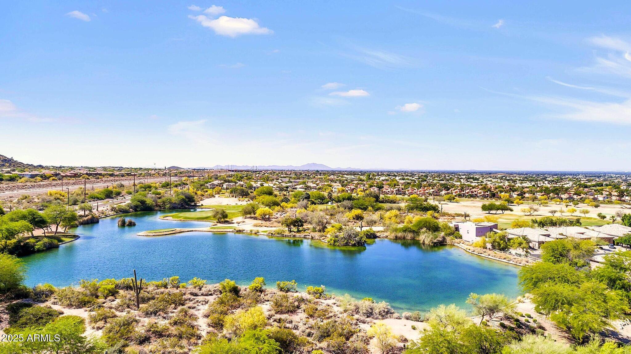 6334 East Viewmont Drive, Unit 57 Mesa, AZ 85215 - Photo 41 of 61 an aerial view of residential building and ocean