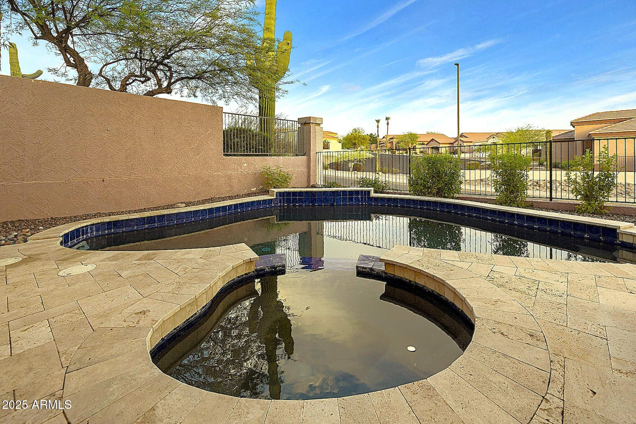 6334 East Viewmont Drive, Unit 57 Mesa, AZ 85215 - Photo 47 of 61 a view of a swimming pool with a terrace