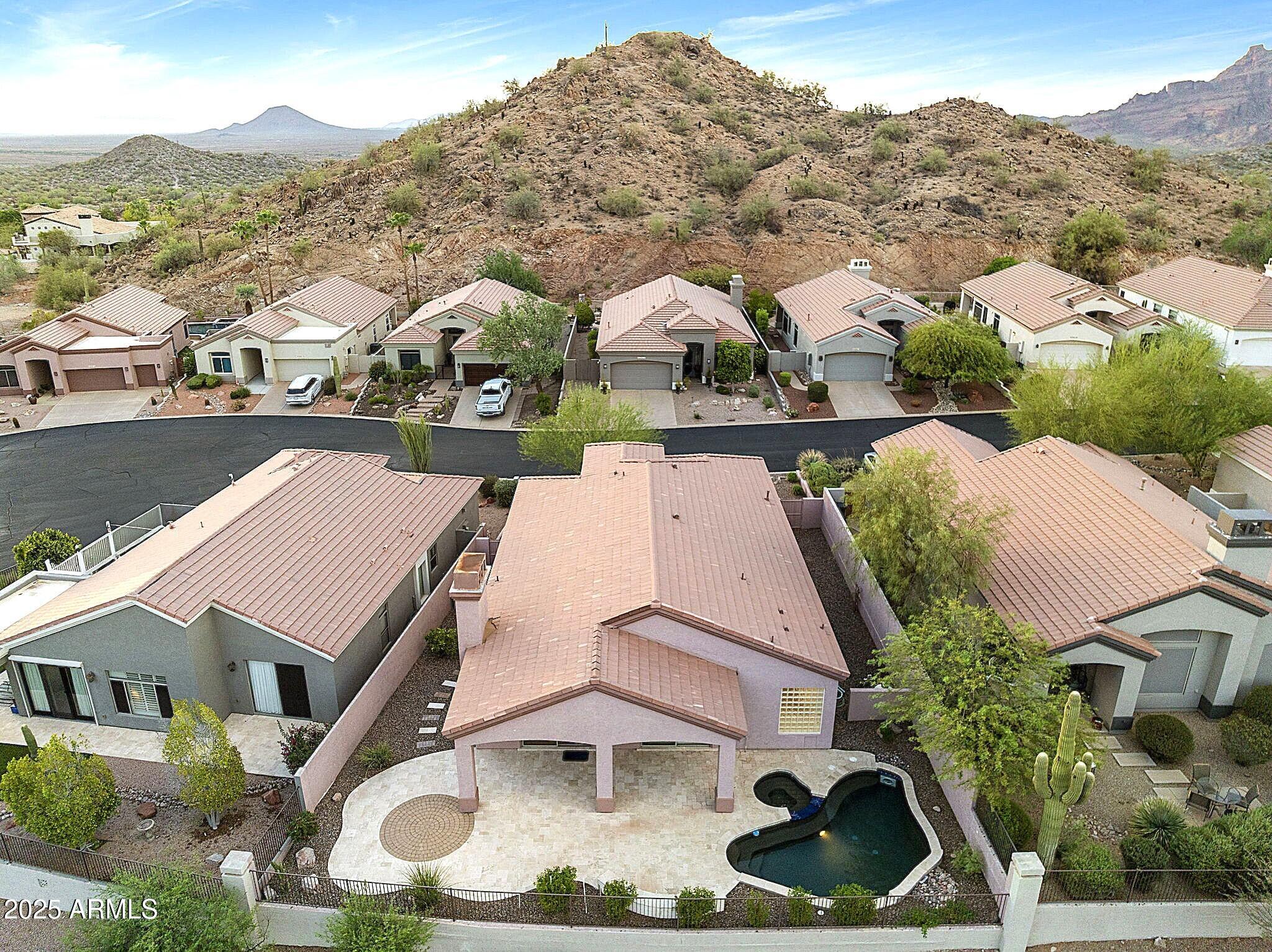 6334 East Viewmont Drive, Unit 57 Mesa, AZ 85215 - Photo 48 of 61 an aerial view of residential houses and outdoor space
