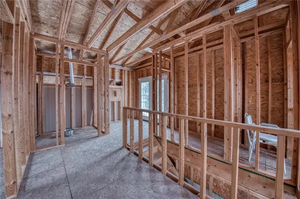 a view of an entryway with wooden walls