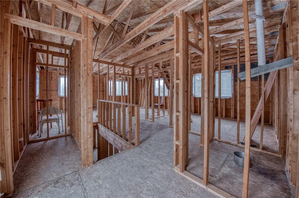 787 Branchton Road Boyers, PA 16020 - Photo 9 of 21 At the top of the stairs, framed closet and hallway to 3 bedrooms and full bath space