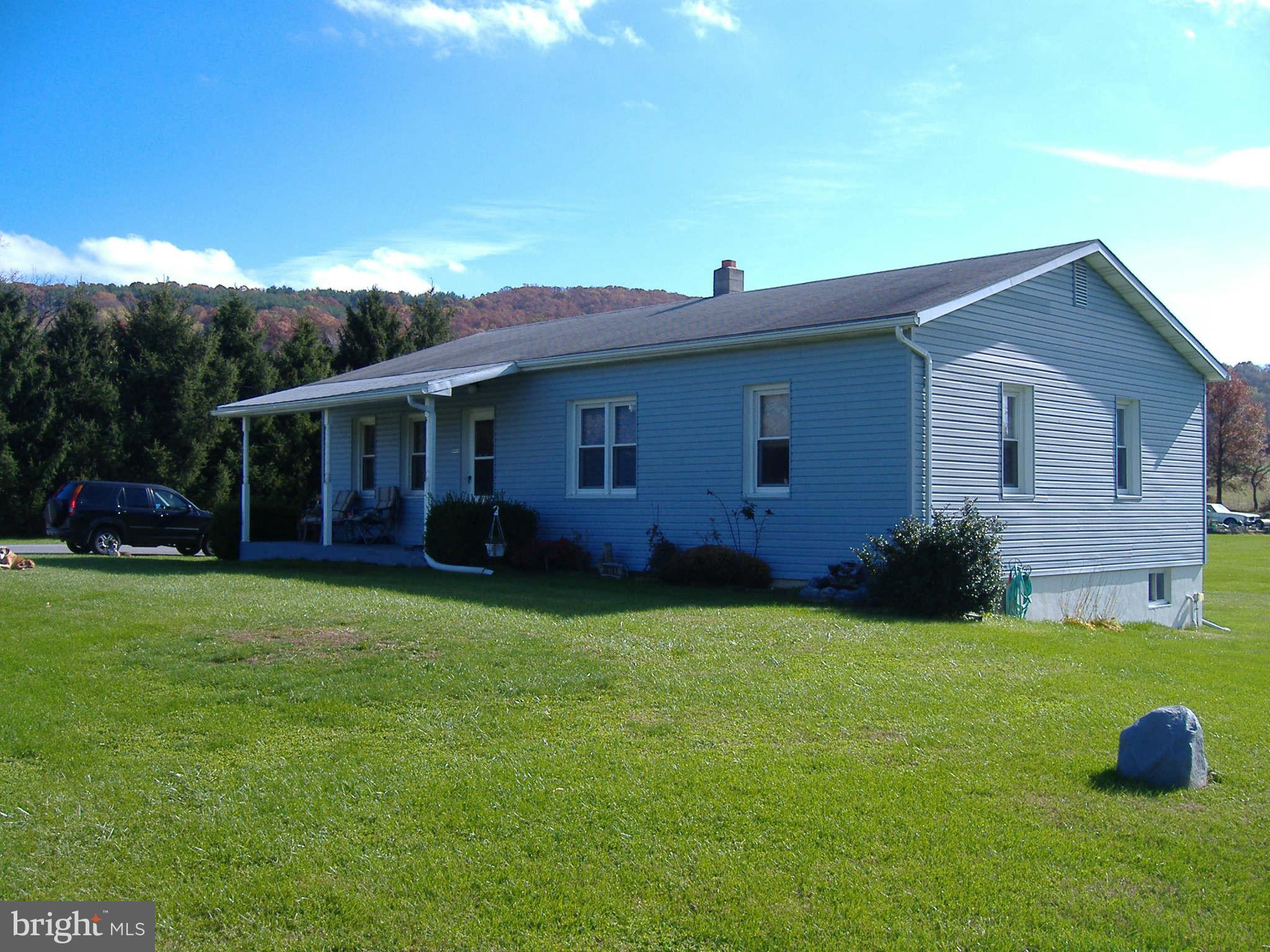 20741 Netz Road Boonsboro, MD 21713 - Photo 1 of 7 a view of a house with backyard and garden