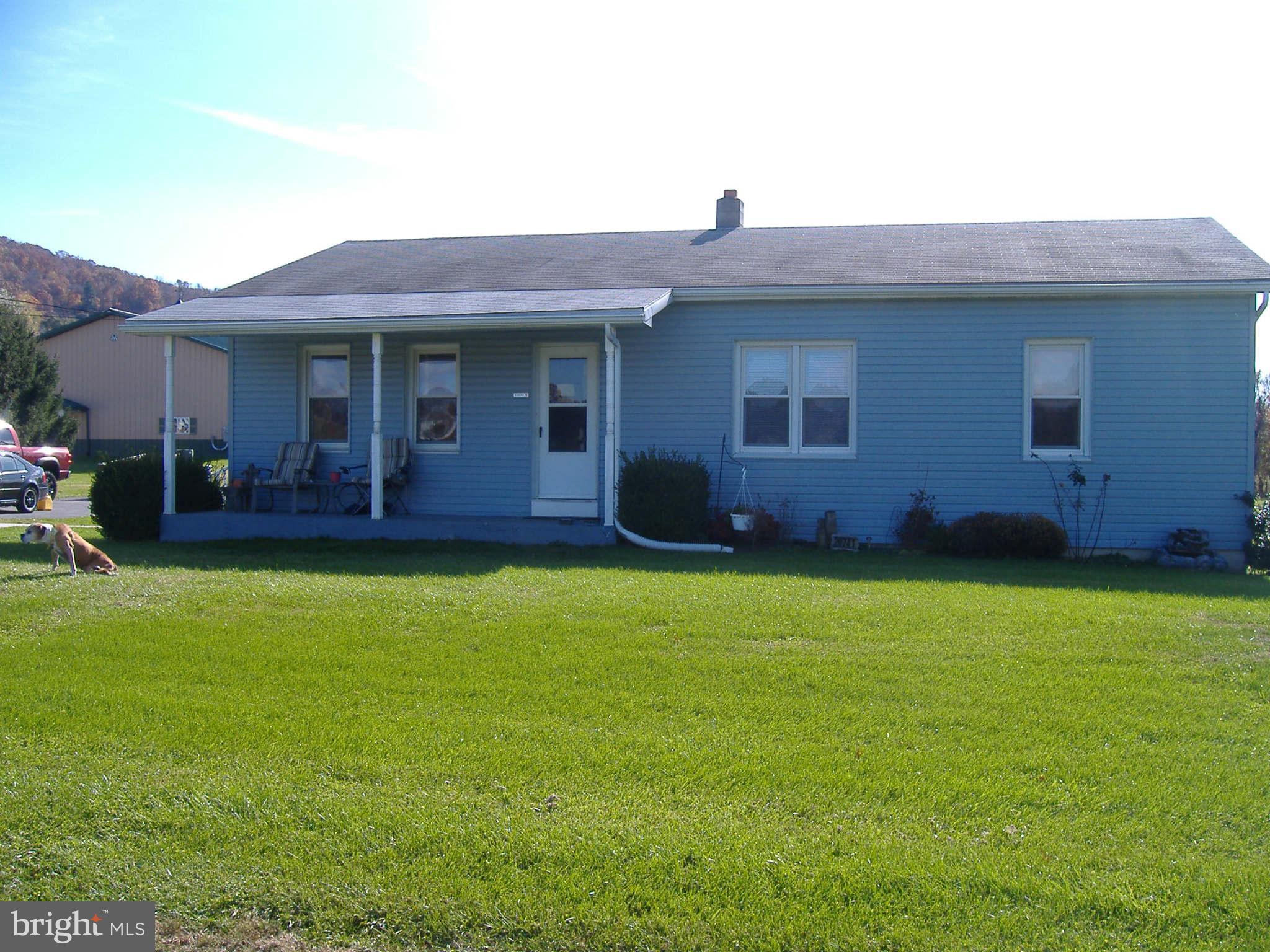 20741 Netz Road Boonsboro, MD 21713 - Photo 2 of 7 a front view of a house with garden