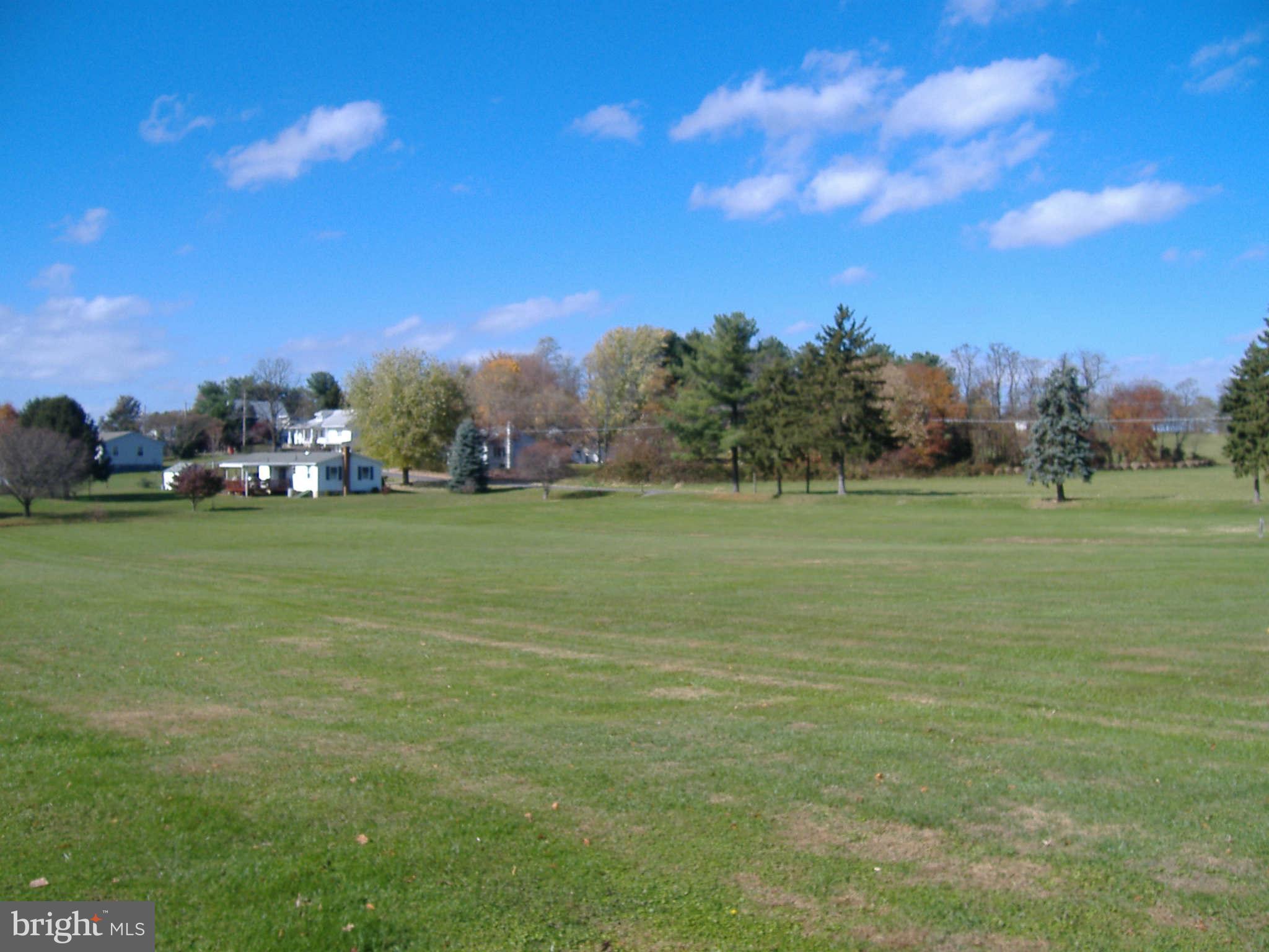 20741 Netz Road Boonsboro, MD 21713 - Photo 7 of 7 a view of a field with trees in the background