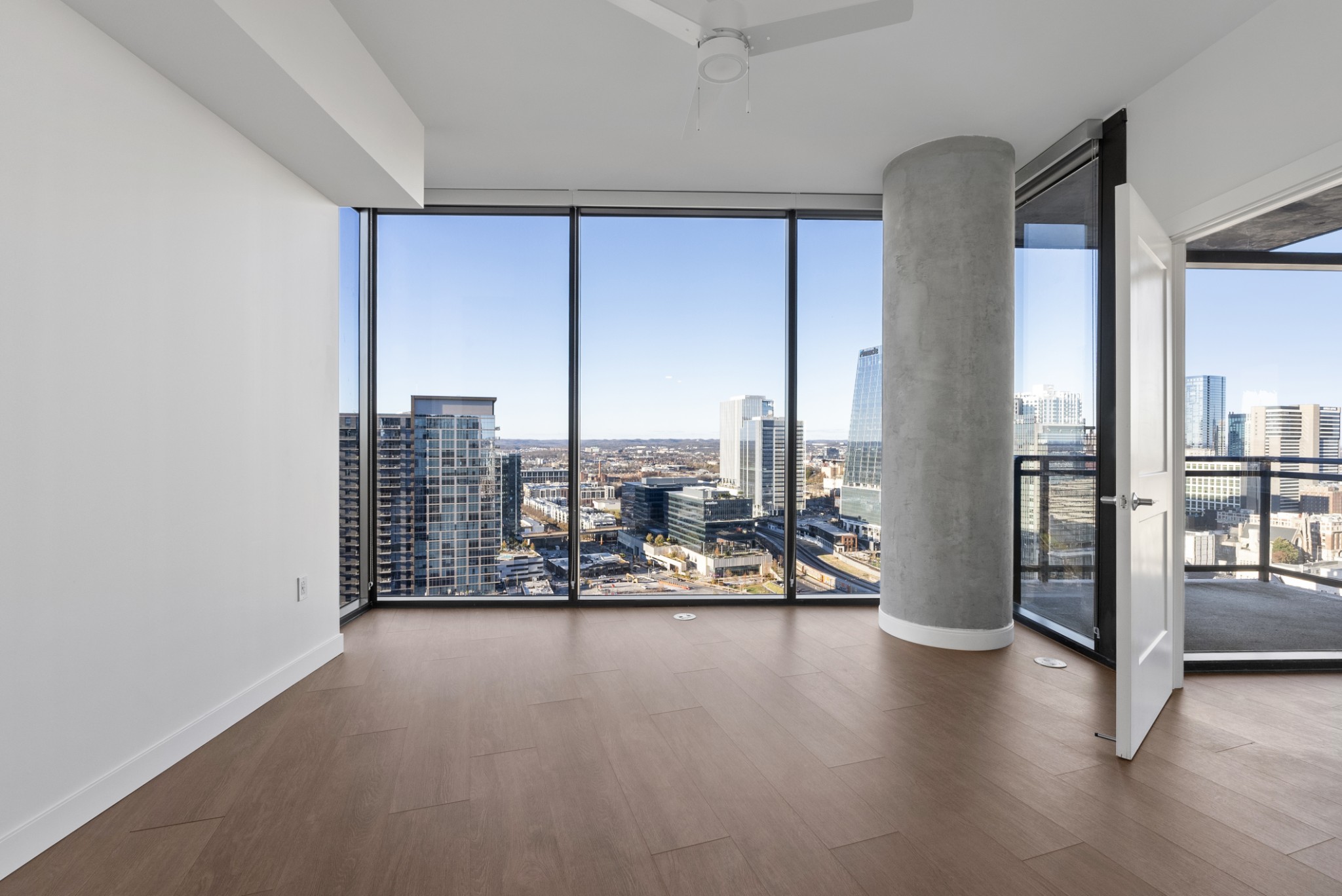 1212 Demonbreun Street, Unit C3D(K) Nashville, TN 37203 - Photo 13 of 33 a view of a room with gym equipment and floor to ceiling window
