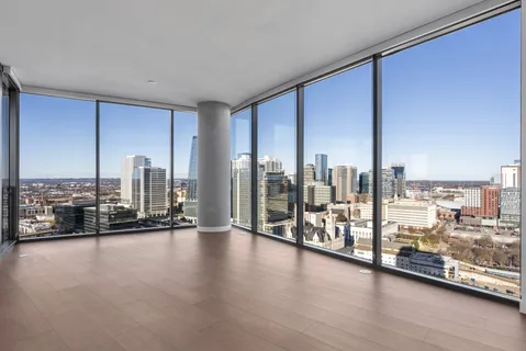 a view of a balcony with city