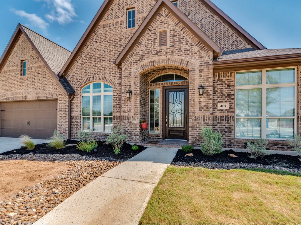 405 Rancho Sienna Loop Georgetown, TX 78628 - Photo 1 of 1 Front of home.