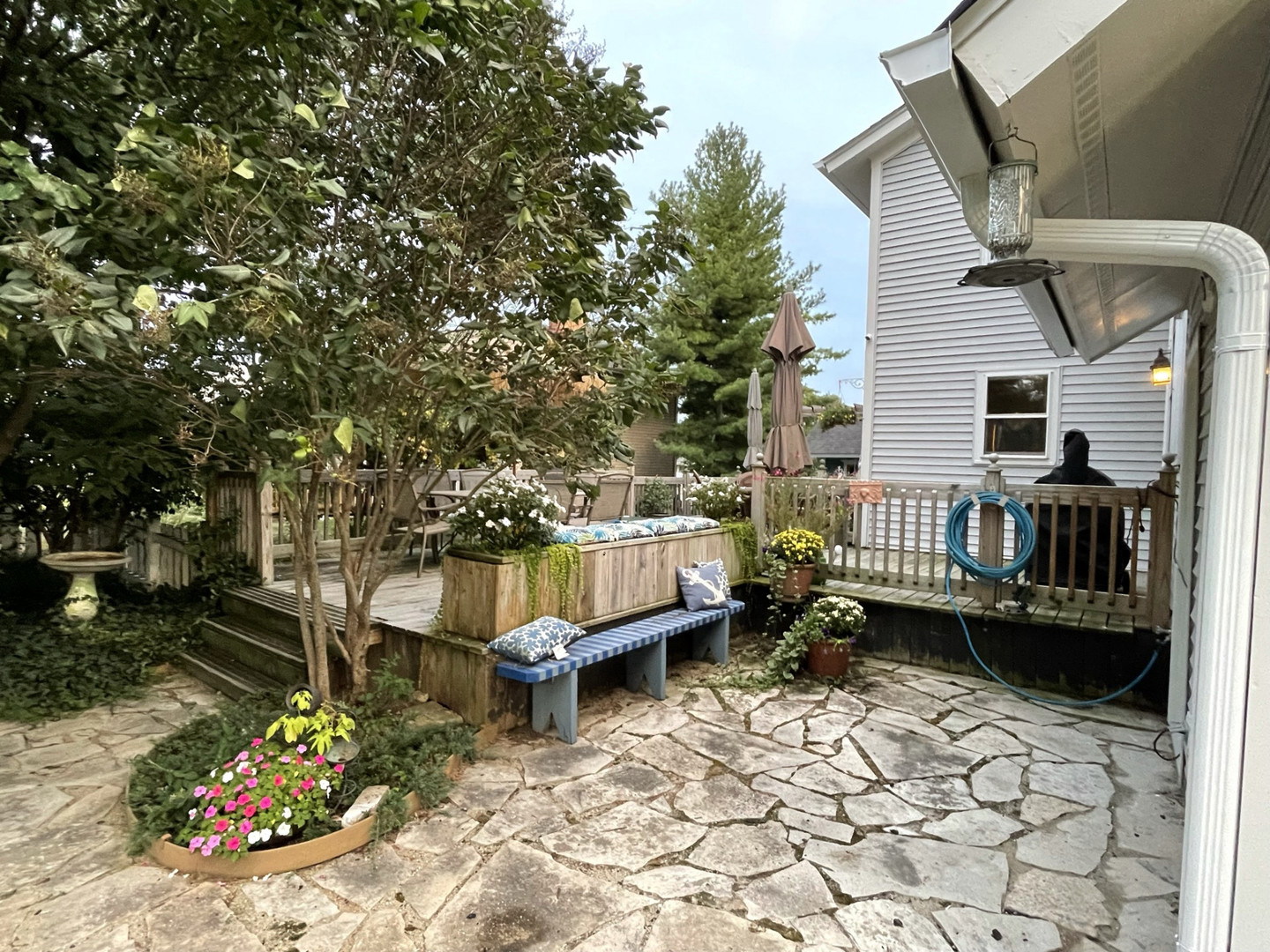 1200 South Raddant Road Batavia, IL 60510 - Photo 14 of 29 a view of a balcony with chairs and a fire pit