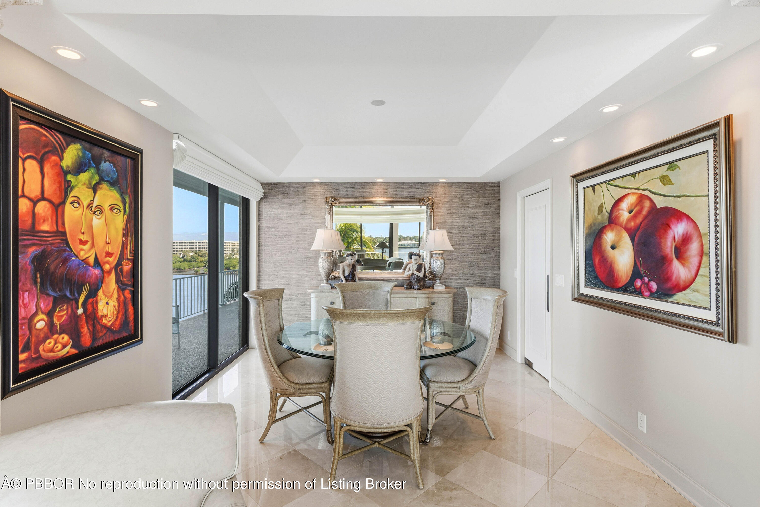 2150 Ibis Isle Road, Unit 15 Palm Beach, FL 33480 - Photo 13 of 47 a dining room with furniture a large window and a fireplace