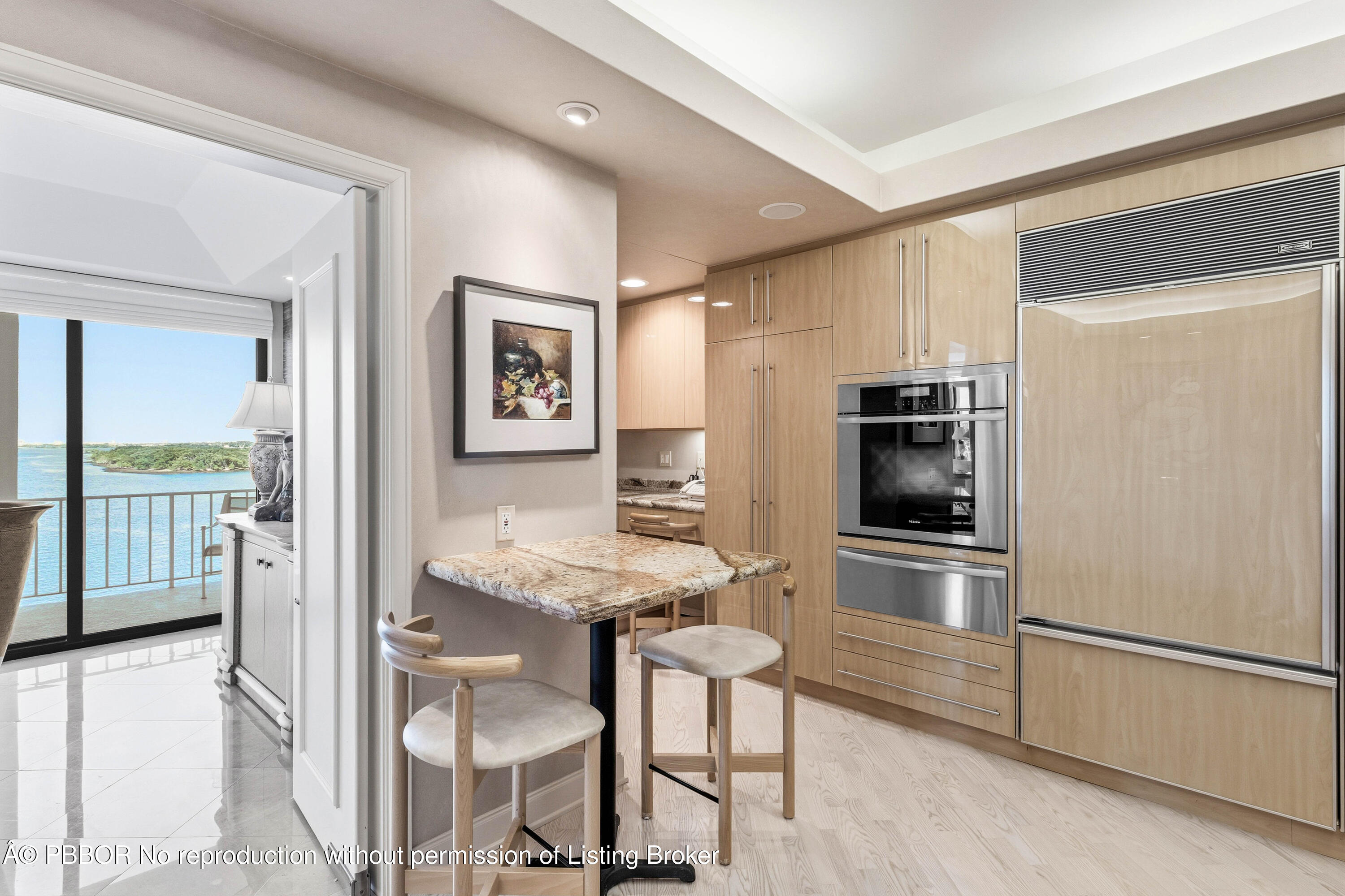 2150 Ibis Isle Road, Unit 15 Palm Beach, FL 33480 - Photo 14 of 47 a kitchen with stainless steel appliances granite countertop a refrigerator and a stove top oven