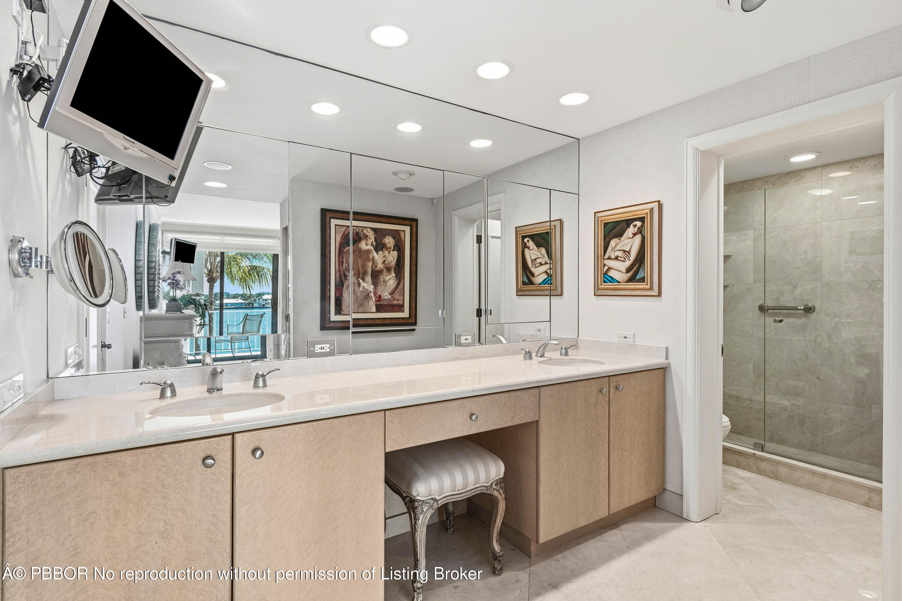 2150 Ibis Isle Road, Unit 15 Palm Beach, FL 33480 - Photo 26 of 47 a spacious bathroom with a double vanity sink a mirror and a bathtub