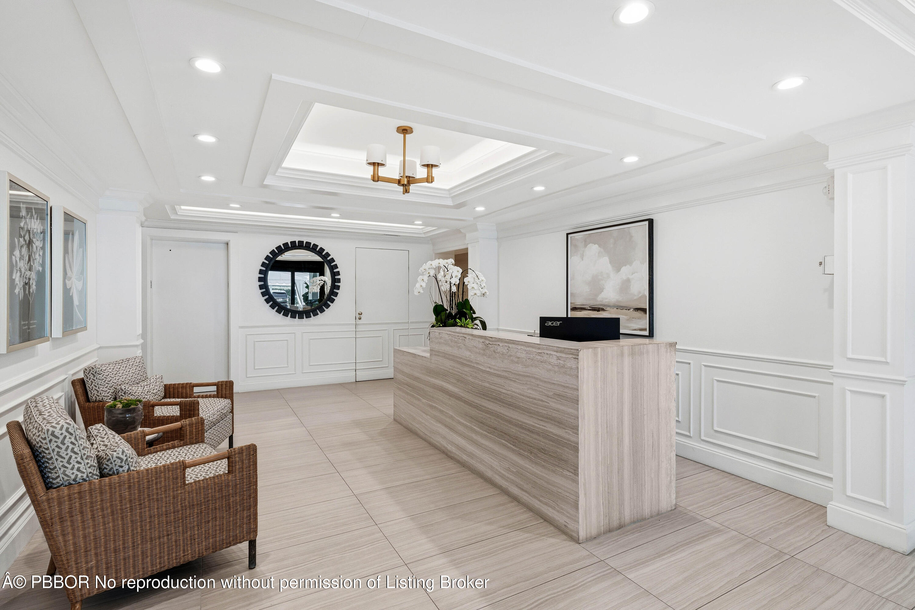2150 Ibis Isle Road, Unit 15 Palm Beach, FL 33480 - Photo 28 of 47 a living room with furniture and a clock