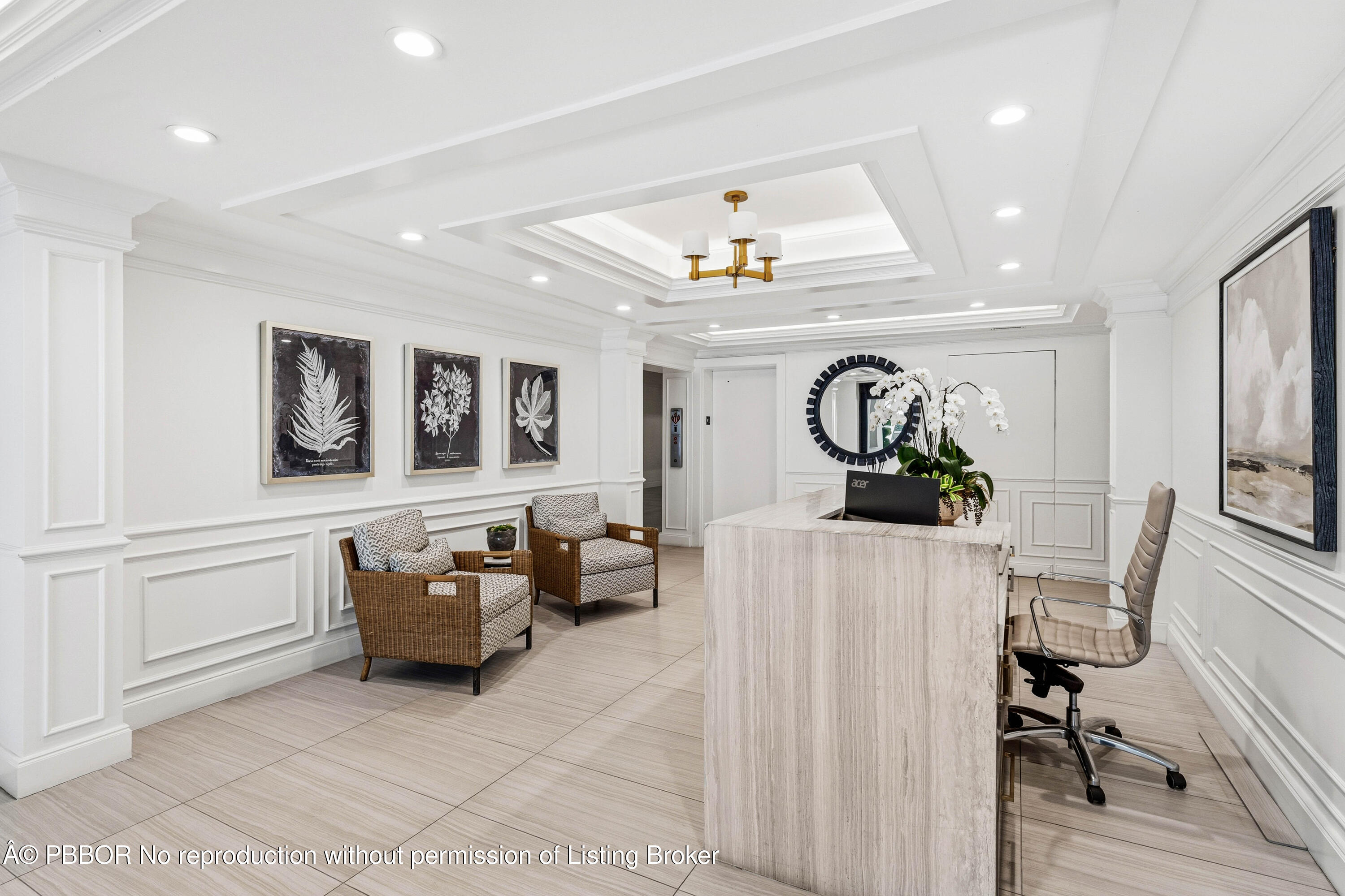 2150 Ibis Isle Road, Unit 15 Palm Beach, FL 33480 - Photo 29 of 47 a living room with furniture and a dining table with wooden floor