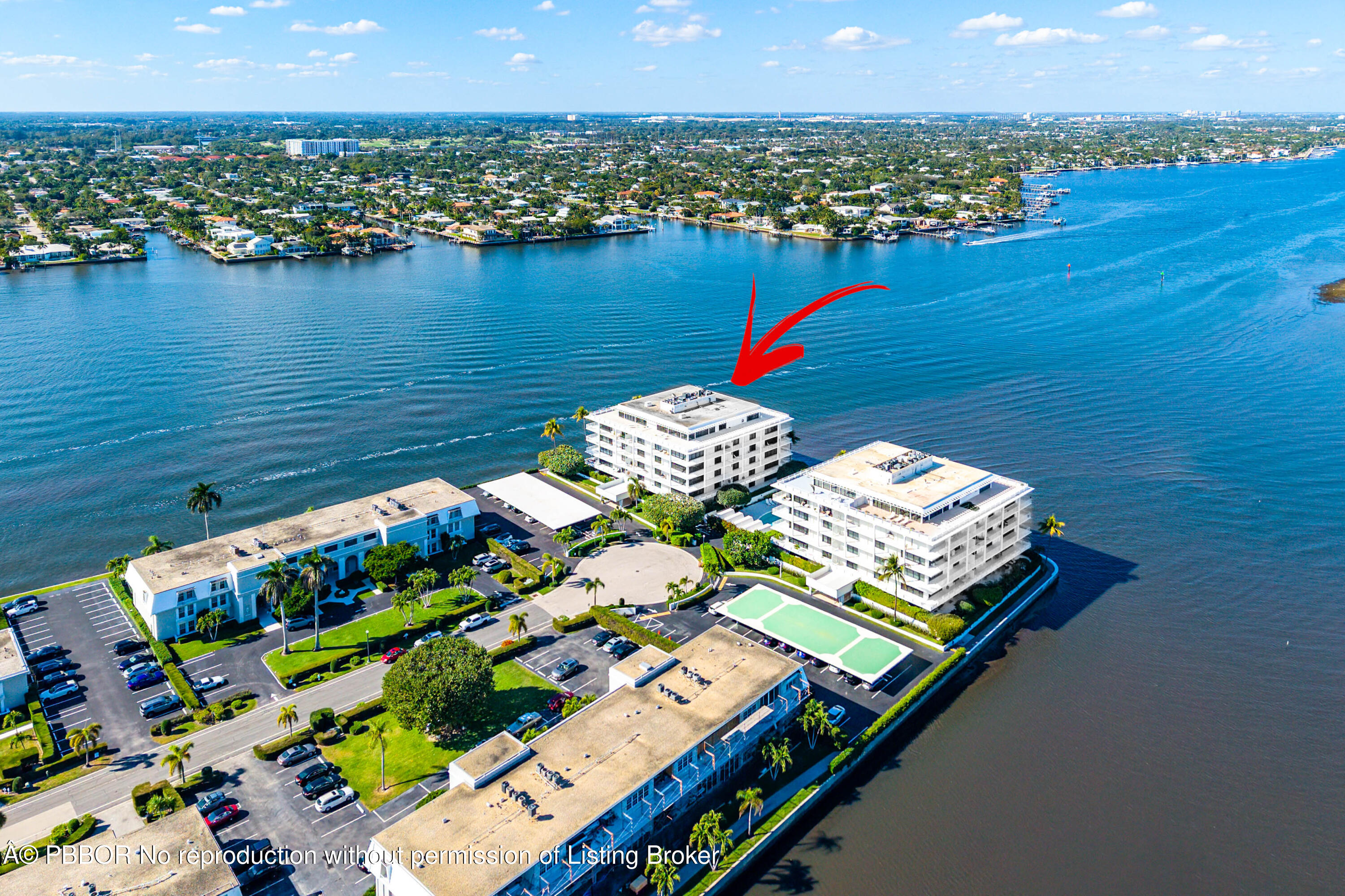 2150 Ibis Isle Road, Unit 15 Palm Beach, FL 33480 - Photo 44 of 47 a wooden floor with a lake view