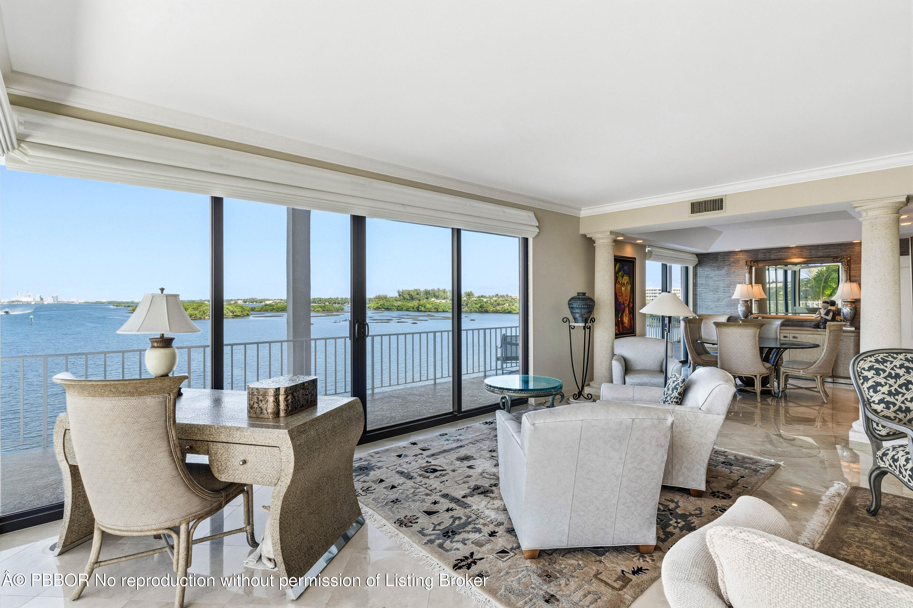 2150 Ibis Isle Road, Unit 15 Palm Beach, FL 33480 - Photo 9 of 47 a living room with furniture and a large window