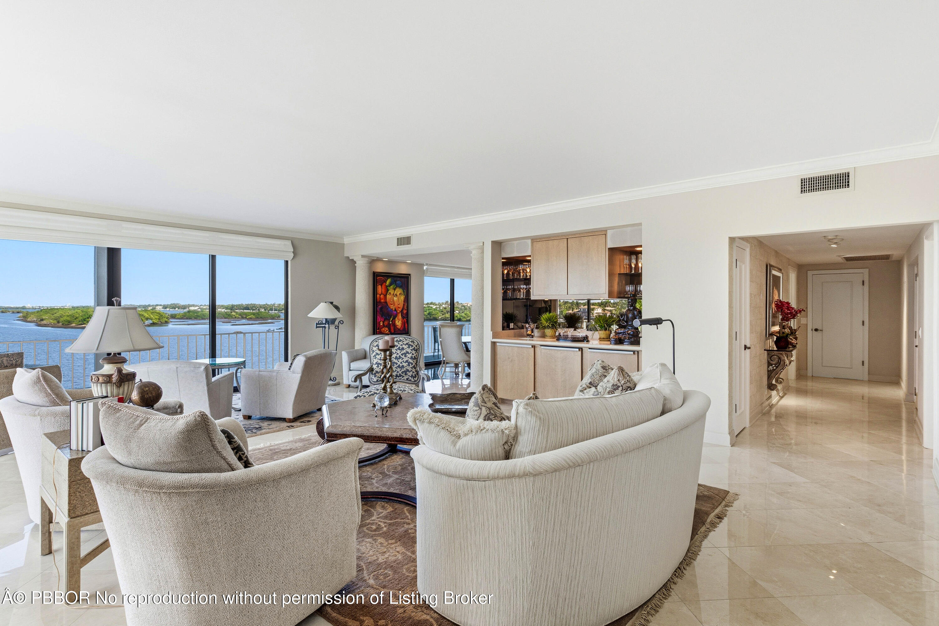 2150 Ibis Isle Road, Unit 15 Palm Beach, FL 33480 - Photo 10 of 47 a living room with furniture and a large window