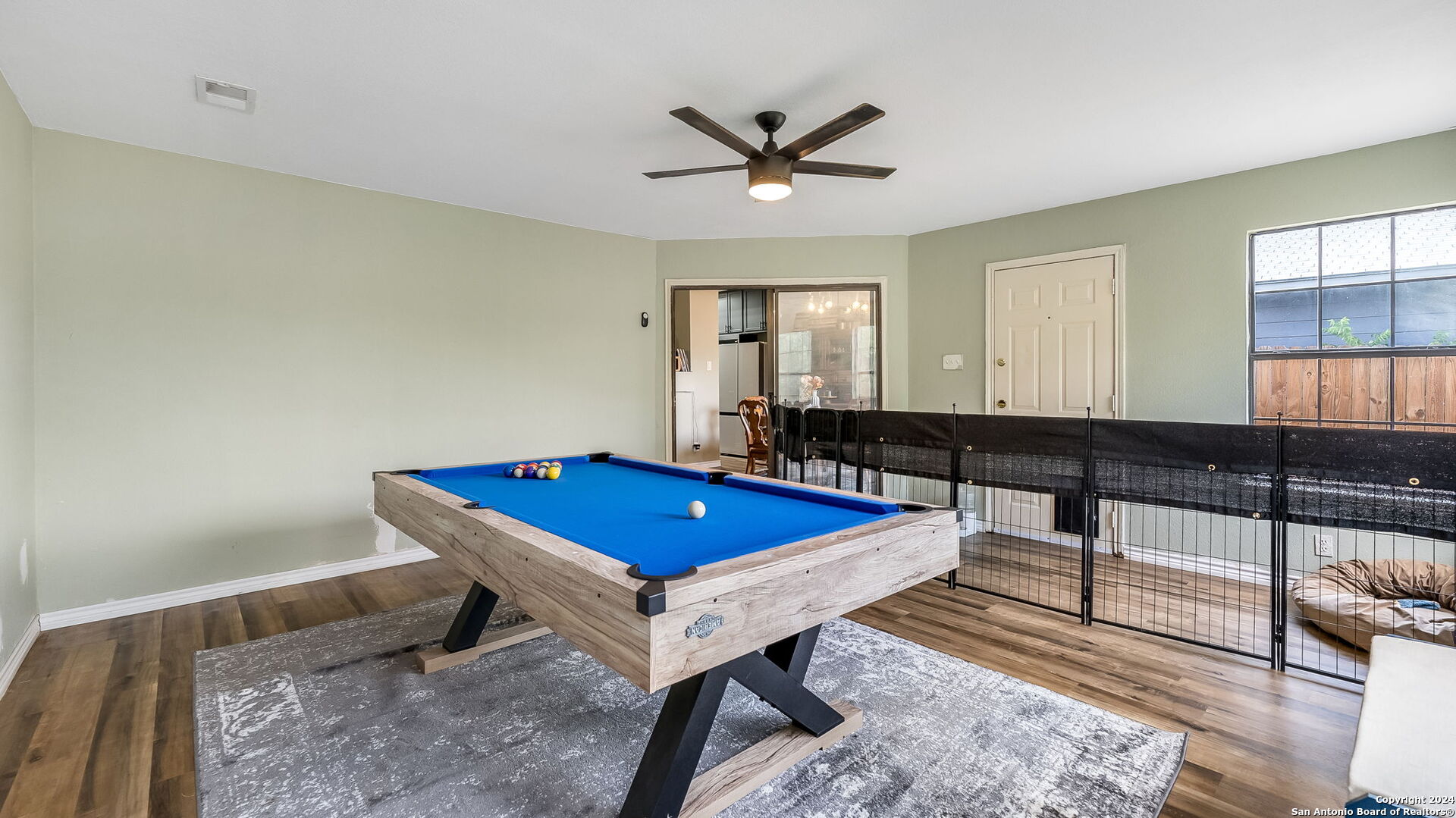 7935 Sonny Ridge San Antonio, TX 78244 - Photo 13 of 22 a room with pool table and windows