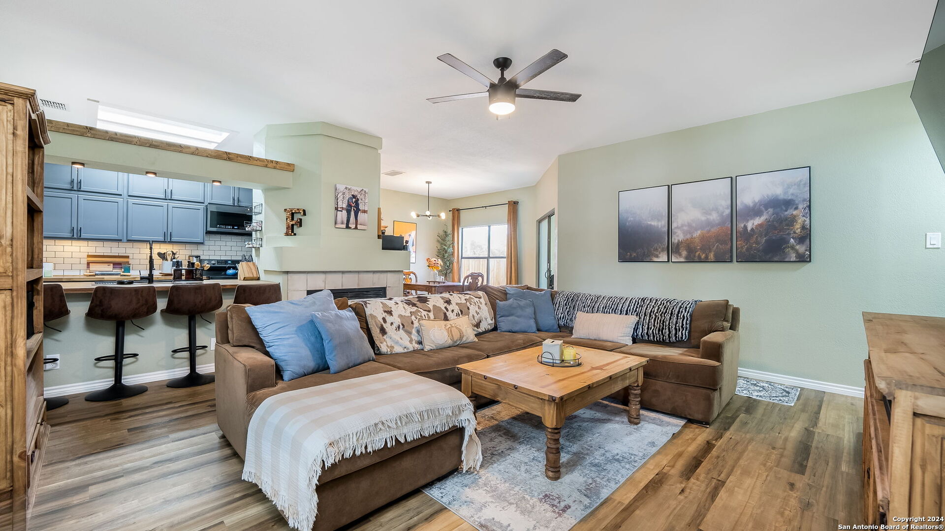 7935 Sonny Ridge San Antonio, TX 78244 - Photo 4 of 22 a living room with furniture and a wooden floor
