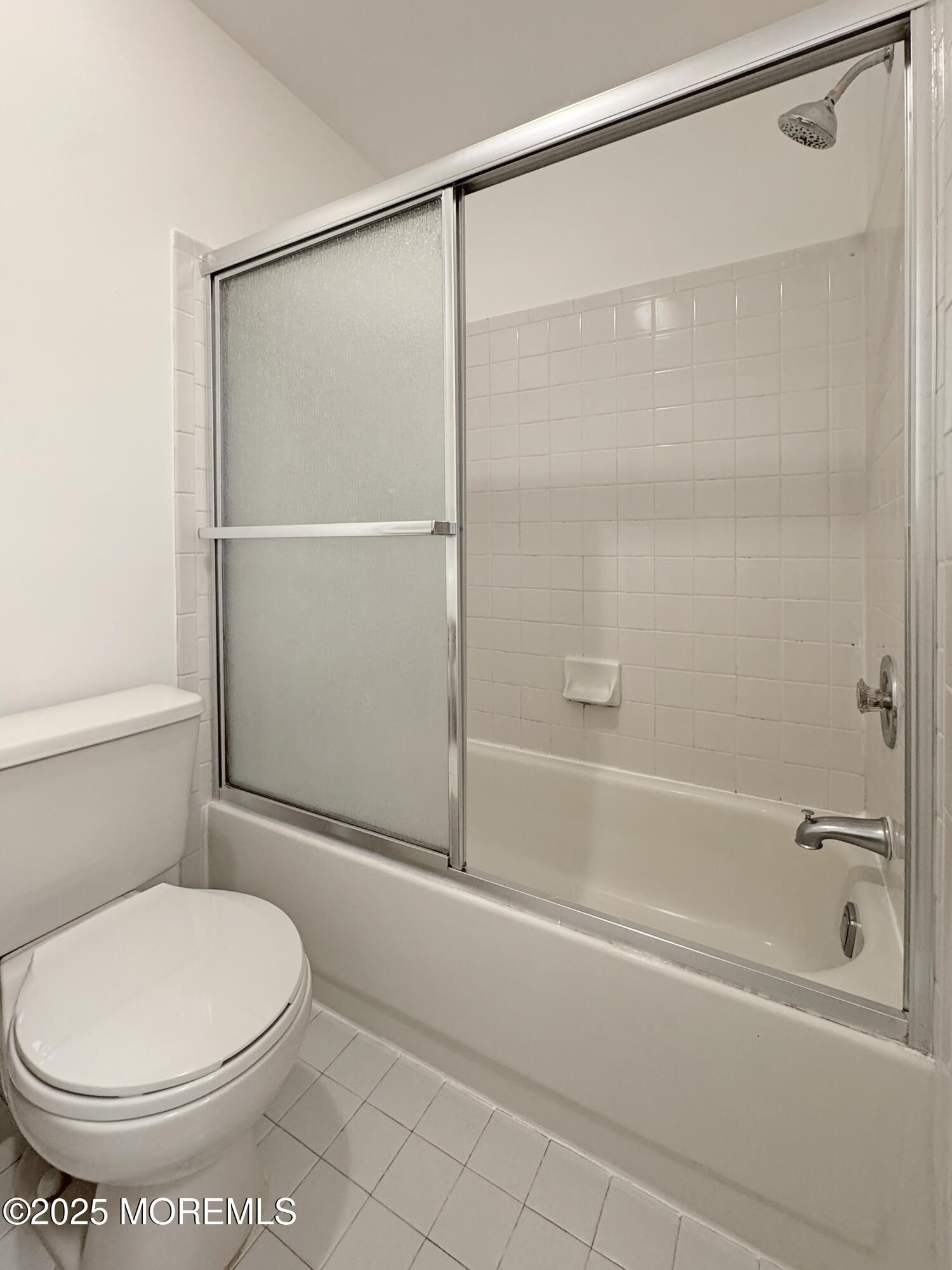 577 Windflower Court Morganville, NJ 07751 - Photo 17 of 27 a bathroom with a toilet and a shower