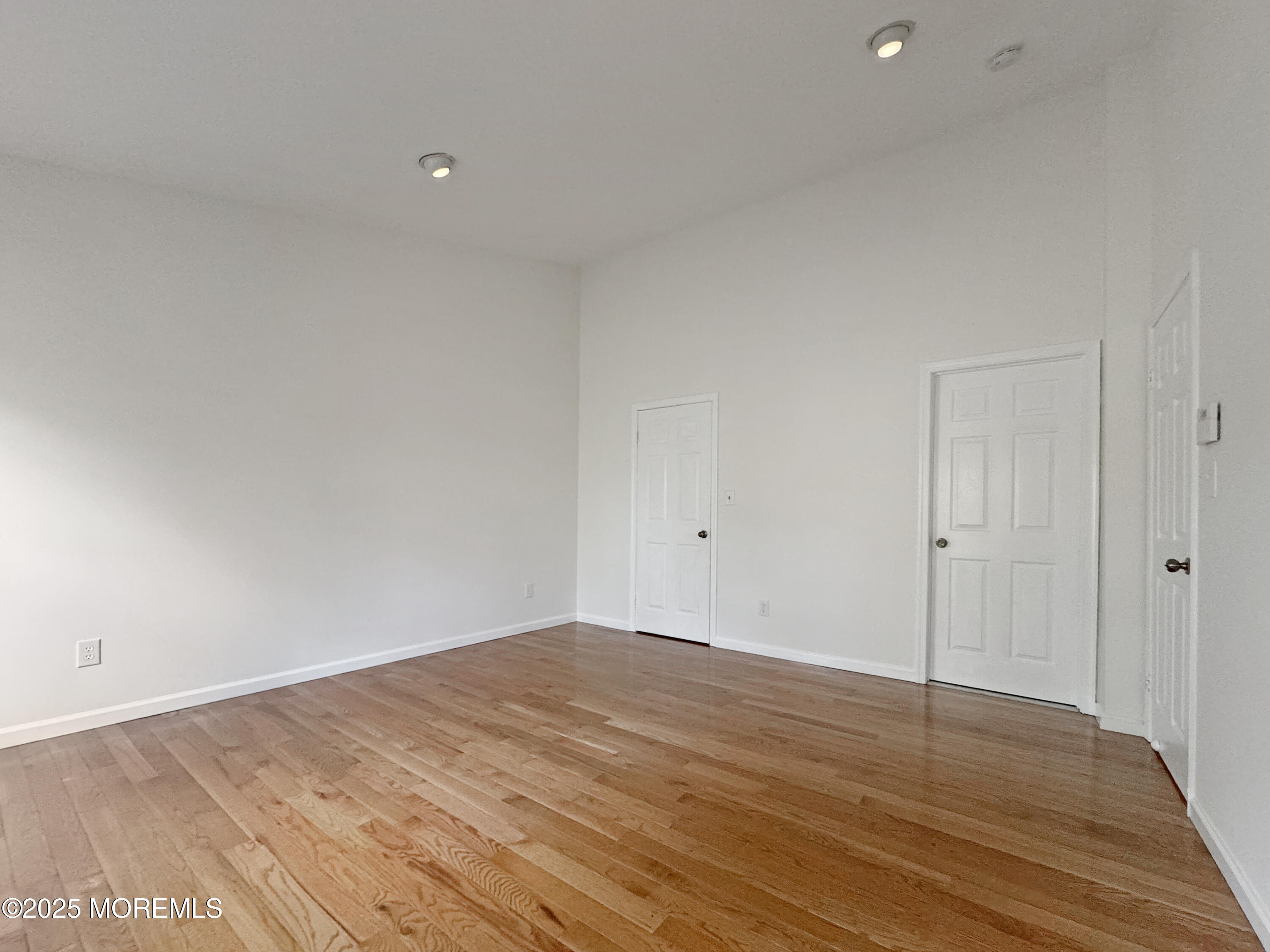 577 Windflower Court Morganville, NJ 07751 - Photo 19 of 27 a view of an empty room