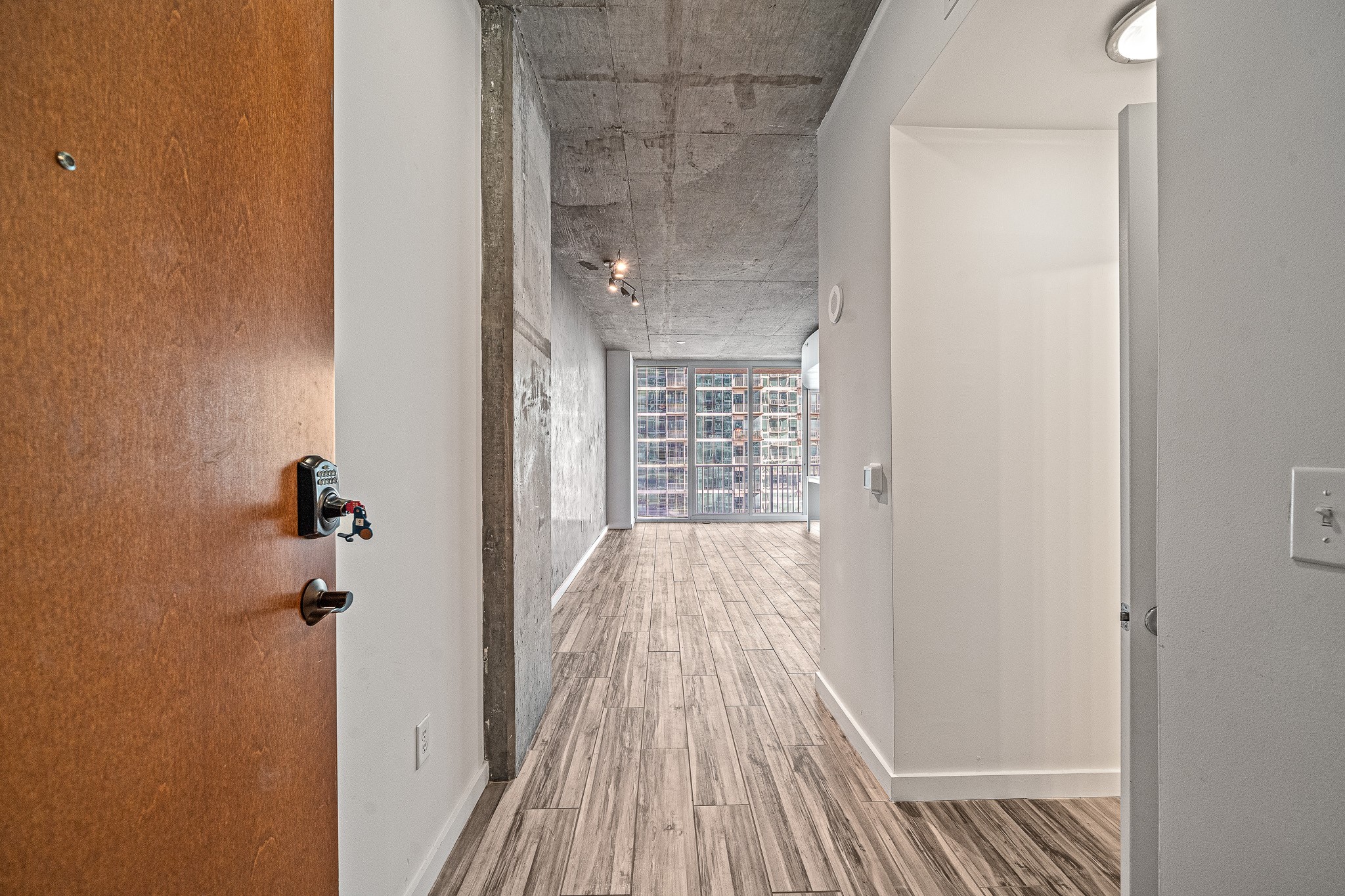 5925 Almeda Road, Unit 11406 Houston, TX 77004 - Photo 4 of 26 a view of balcony with wooden floor