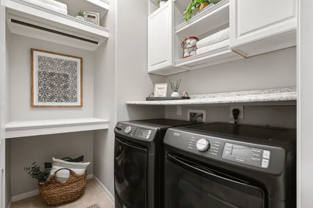 a kitchen with a stove and a microwave