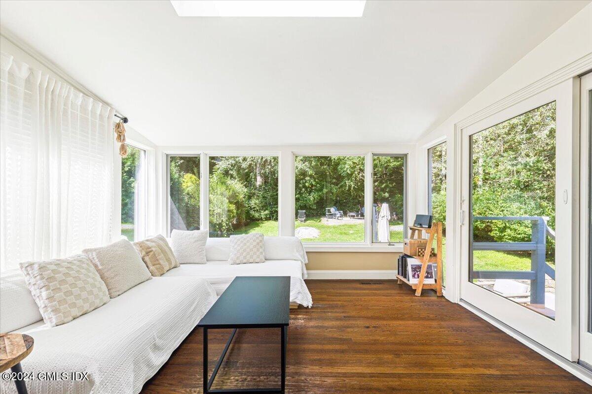 70 Gregory Road Cos Cob, CT 06807 - Photo 12 of 39 a living room with furniture and a large window