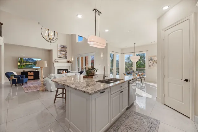 a kitchen with a table and chairs in it