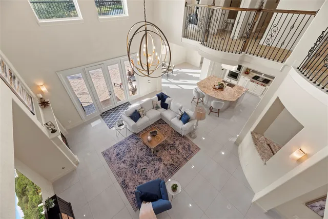 a view of living room with furniture and fireplace