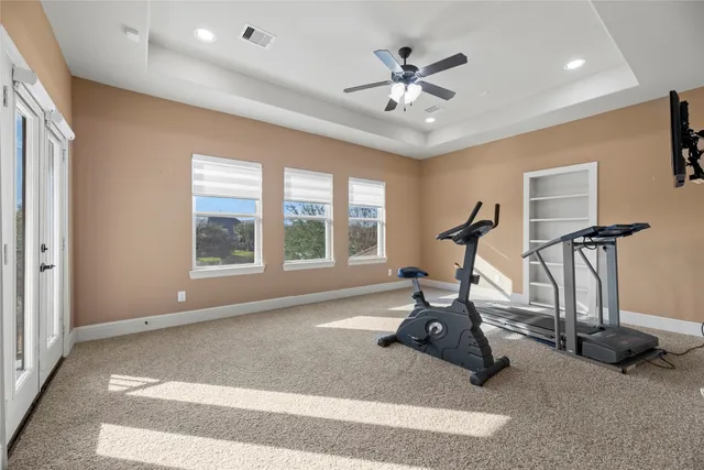 a view of a room with gym equipment