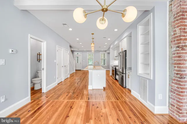 a view of a living room with a large window
