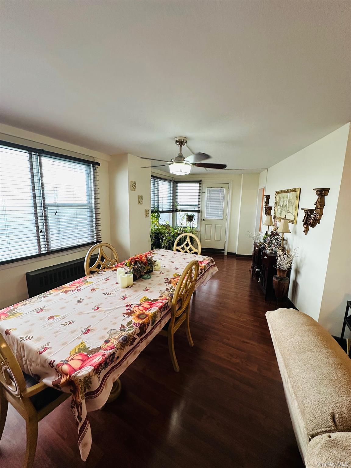 3121 Middletown Road, Unit 4K Bronx, NY 10461 - Photo 13 of 30 a living room with furniture fireplace and windows