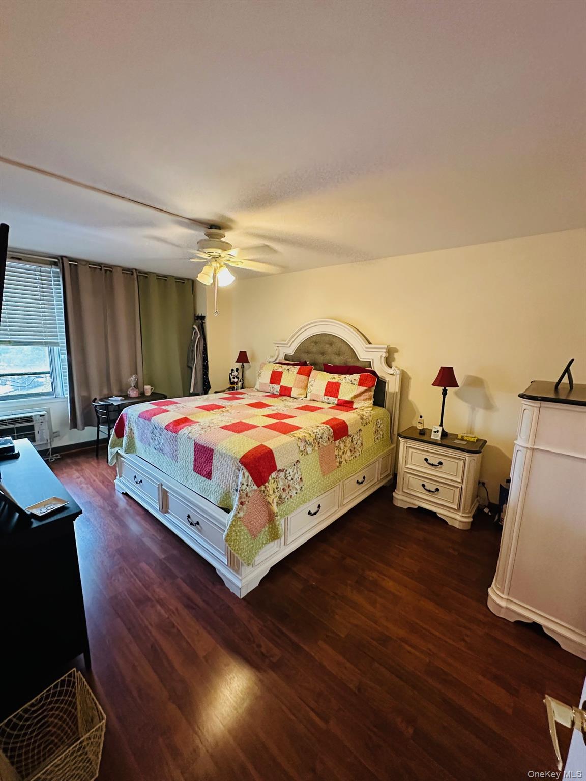 3121 Middletown Road, Unit 4K Bronx, NY 10461 - Photo 17 of 30 a bedroom with a bed and wooden floor
