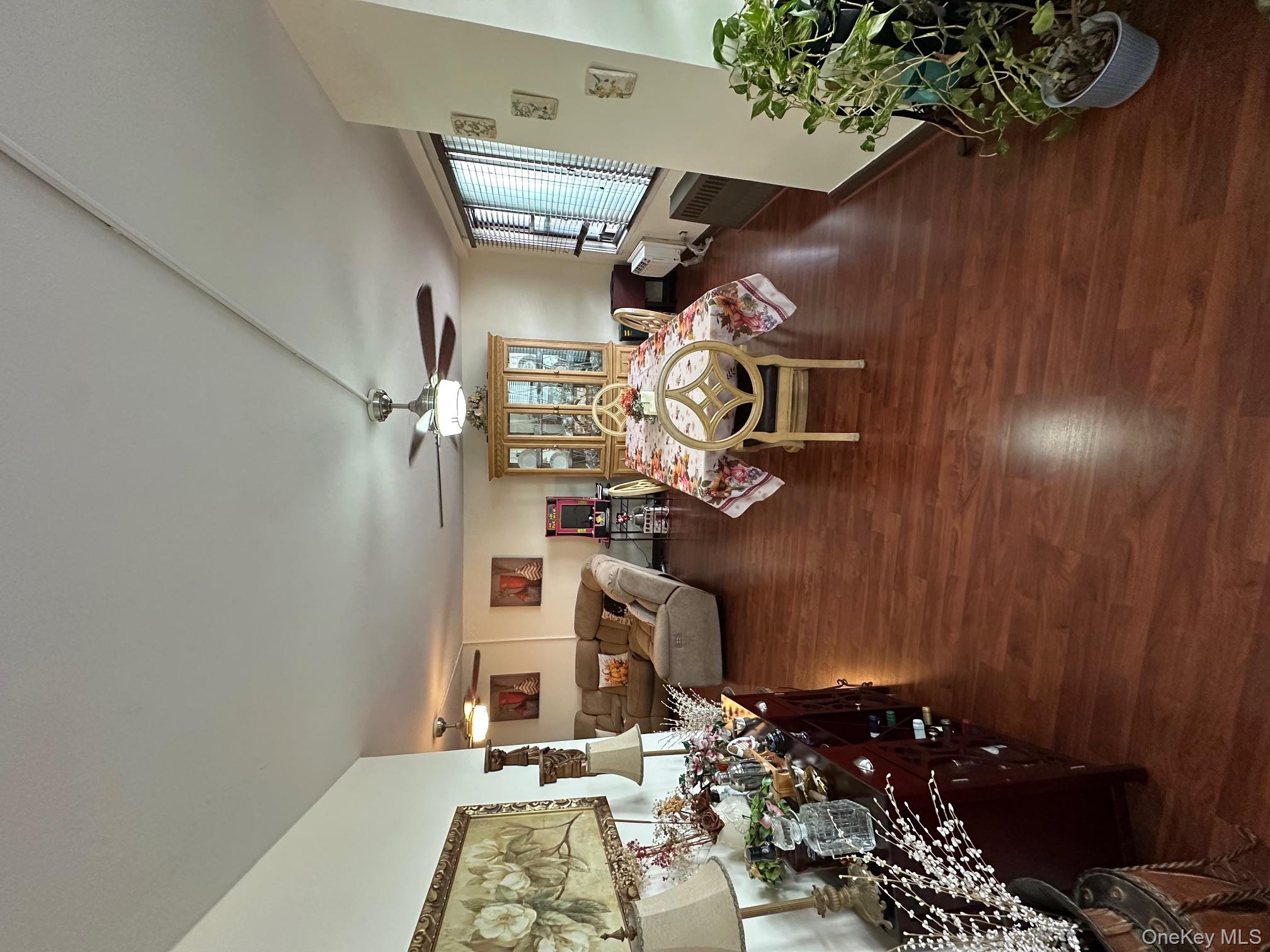 3121 Middletown Road, Unit 4K Bronx, NY 10461 - Photo 10 of 30 a living room with furniture and wooden floor