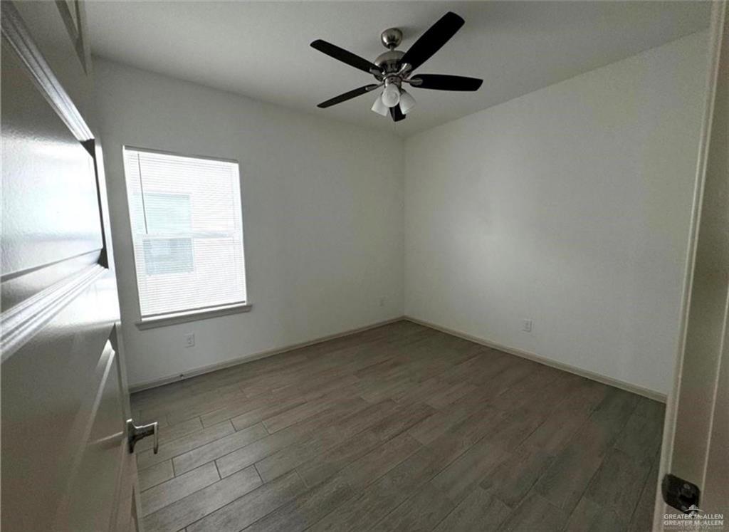 7710 North 58th Street, Unit 2 Mission, TX 78573 - Photo 5 of 13 a view of a room with a window