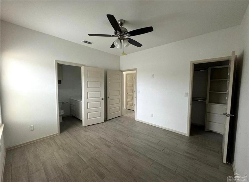 7710 North 58th Street, Unit 2 Mission, TX 78573 - Photo 6 of 13 a view of an empty room with a window