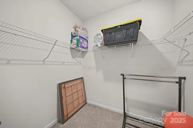 a bedroom with furniture and a fireplace